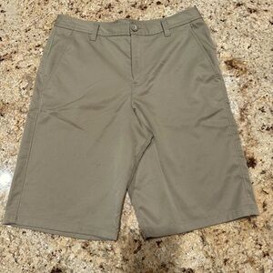 UA boys golf shorts